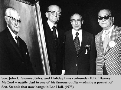 Sen. John C. Stennis, Giles, and Holiday Inns co-founder E.B. 'Barney' McCool -- nattily clad in one of his famous outfits -- admire a portrait of Sen. Stennis that now hangs in Lee Hall. (1973)