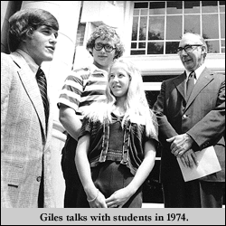 Giles talks with students in 1974.